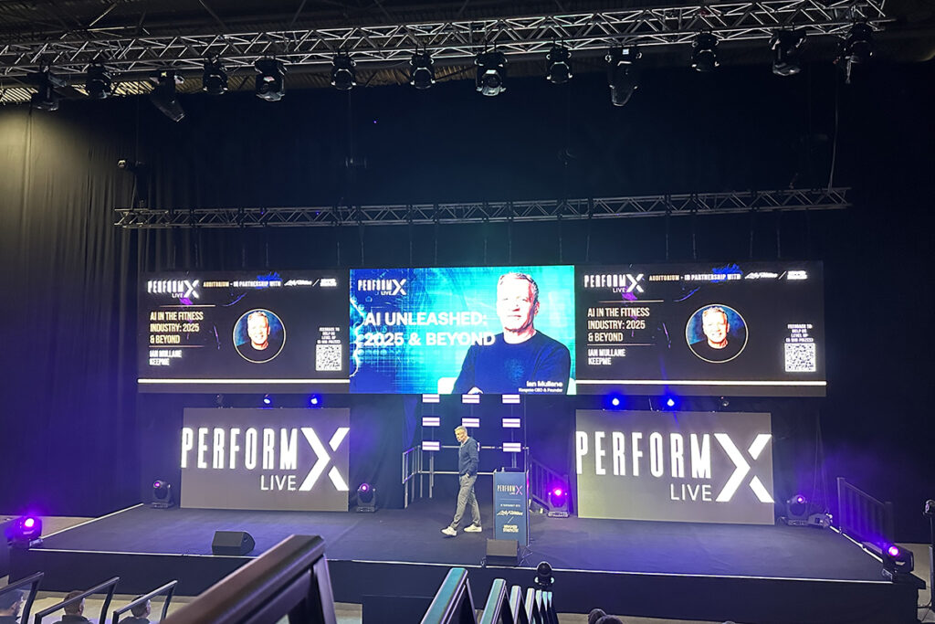 A photo from PerformX Live 2025 of Ian Mullane from Keepme ai on the main stage